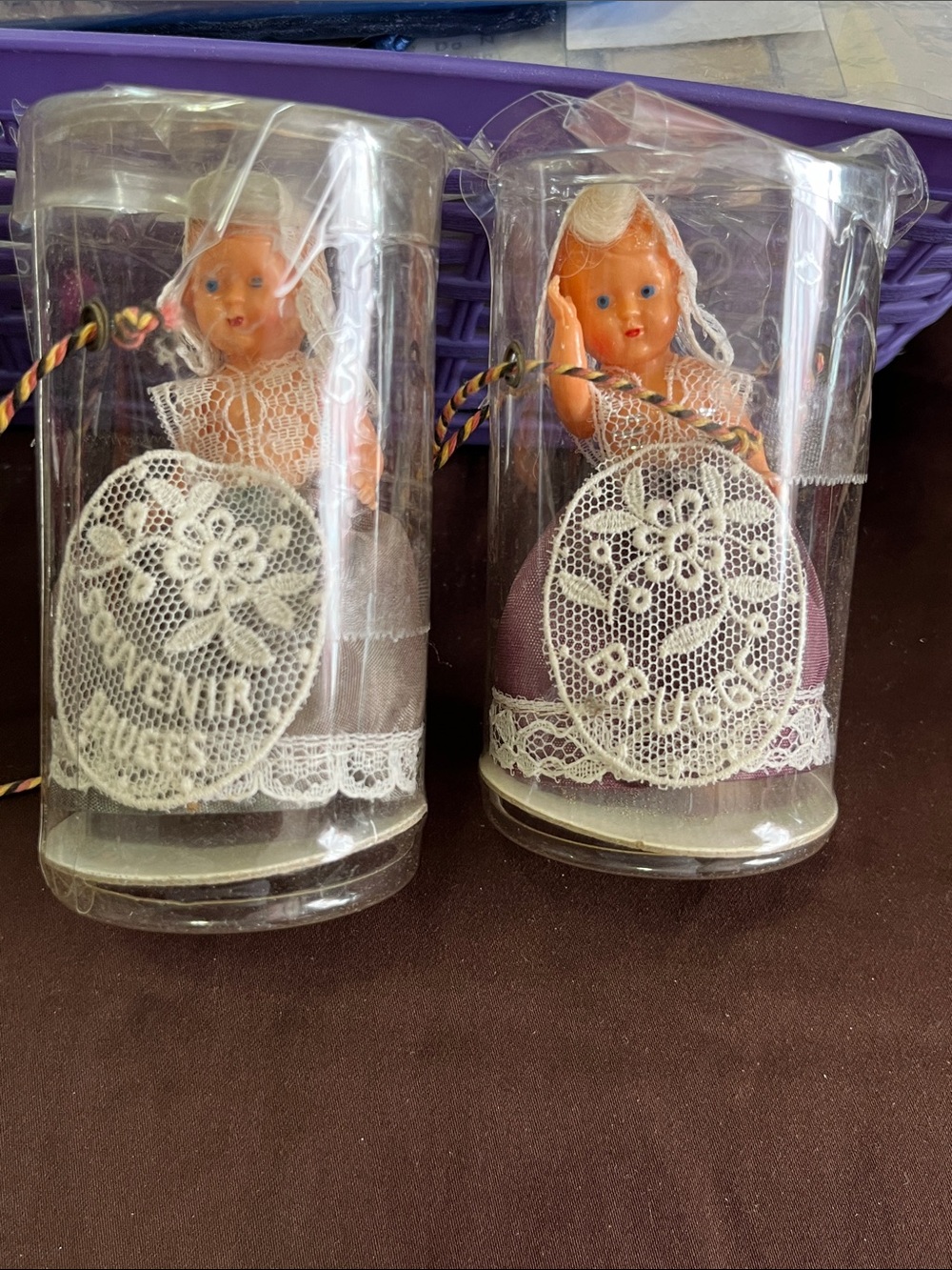 Antique purple and white lace souvenir doll pair by Antique